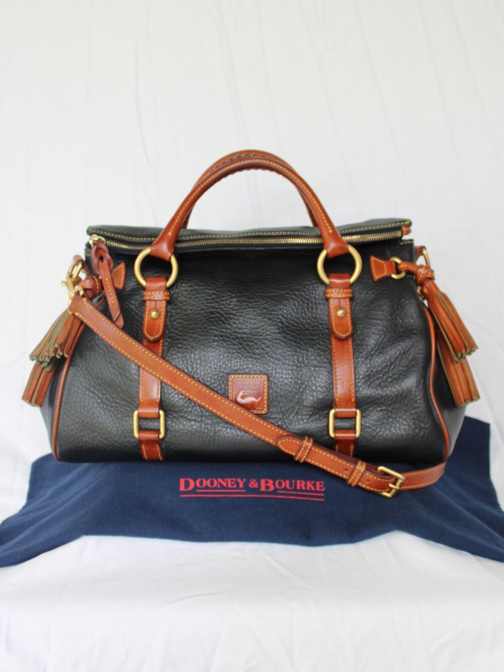 Dooney & Bourke black tan pebbled leather Florentine satchel tassel crossbody